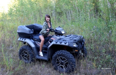 Young girl Andi Land shows her tiny tits and pussy on top of a four wheeler 55517406